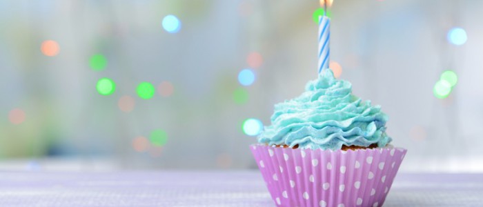 bigstock-Delicious-birthday-cupcake-on-75471103-848x500